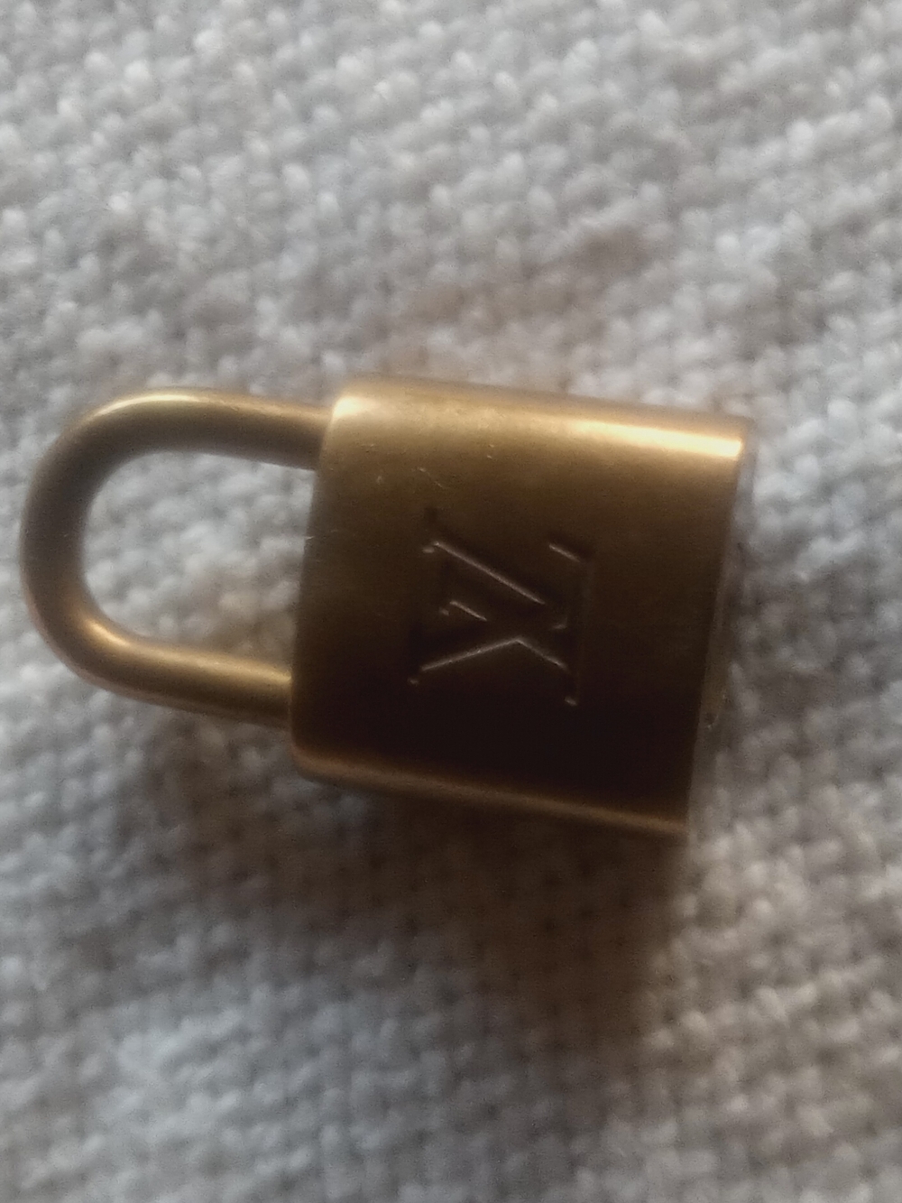 Louis Vuitton Brass-Tone Padlock in Gold